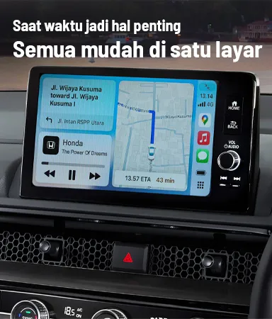 Monitor layar sentuh terintegrasi di dasbor interior Honda CRV, menampilkan desain modern dan tombol kontrol.